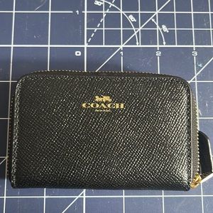 Coach zipper wallet.
